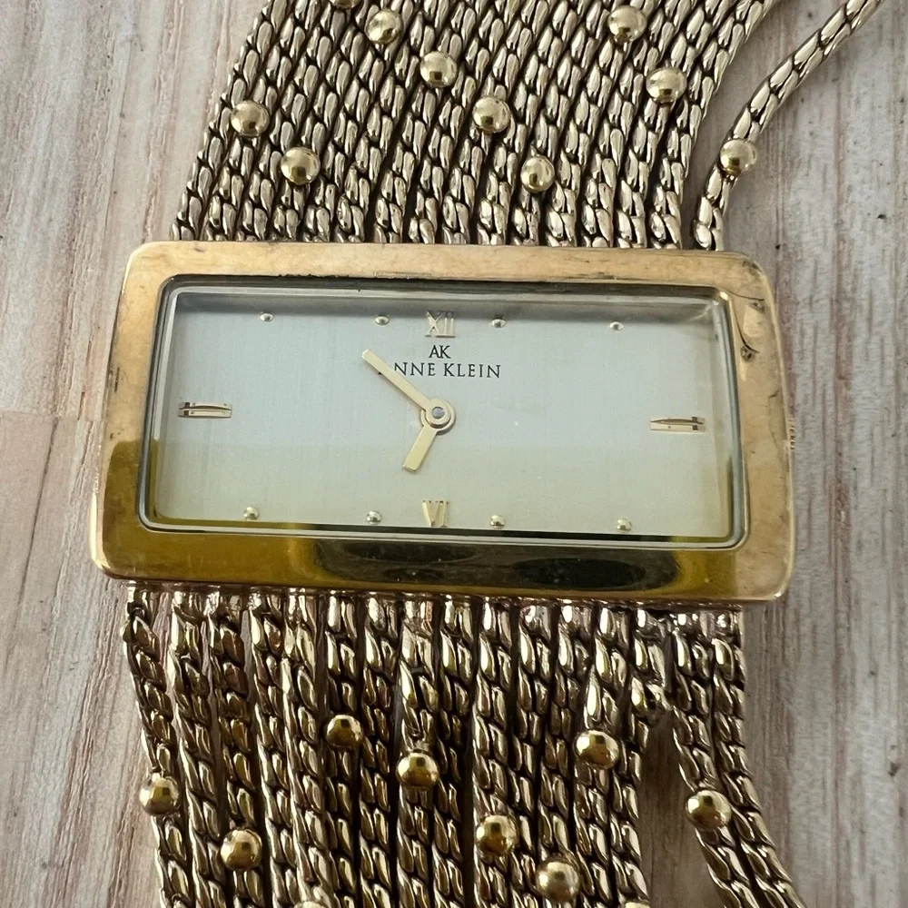 Anne Klein ladies gold tone multi strand bracelet watch NEW BATTERY